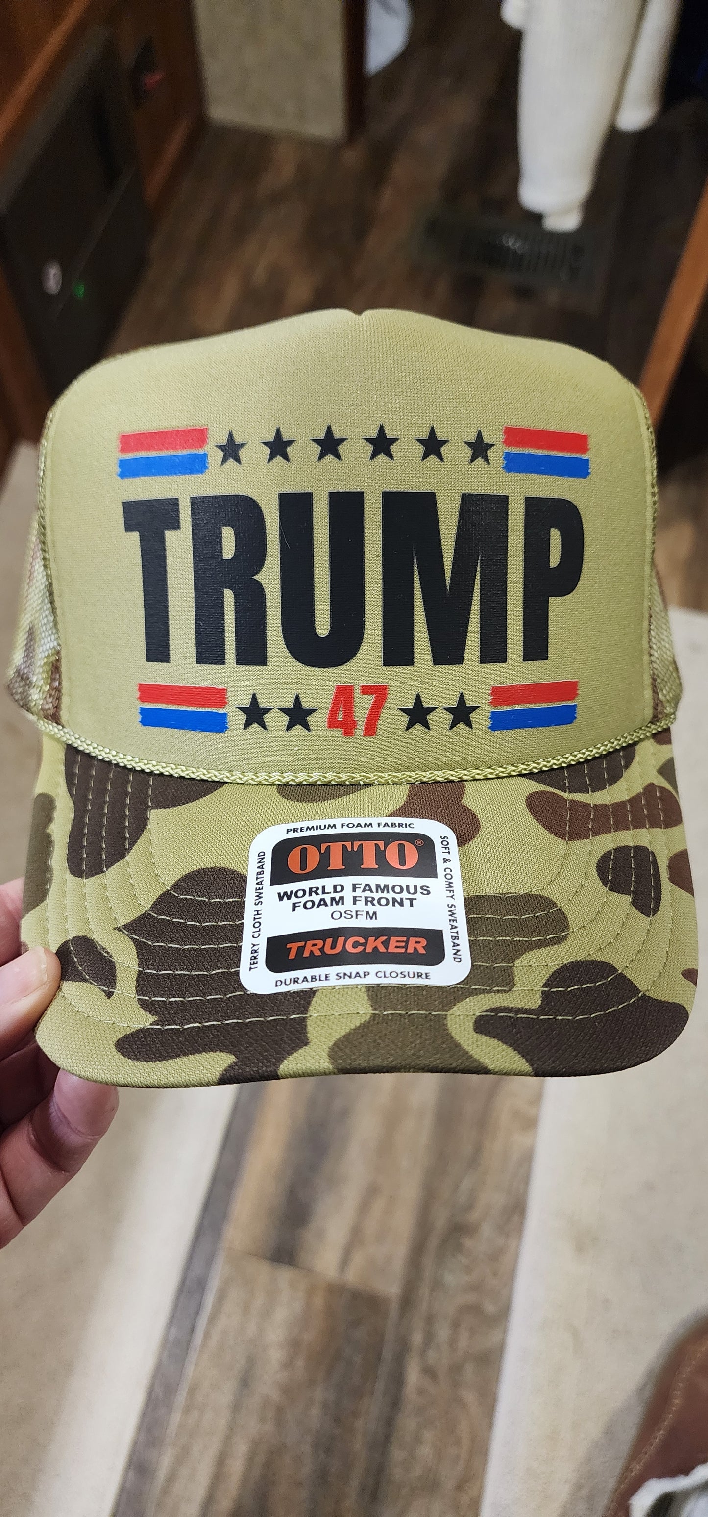 Trump 47 hat on a light green camo Otto hat